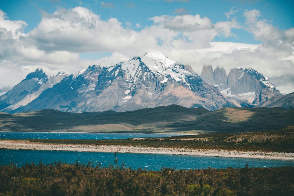 Scenic landscape of Torres del Paine mountains and lake in Chilean Patagonia.